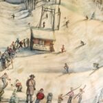 A portrait of skiers lining up at a lodge on a snowy mountain.