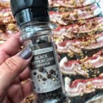 A black pepper grinder.