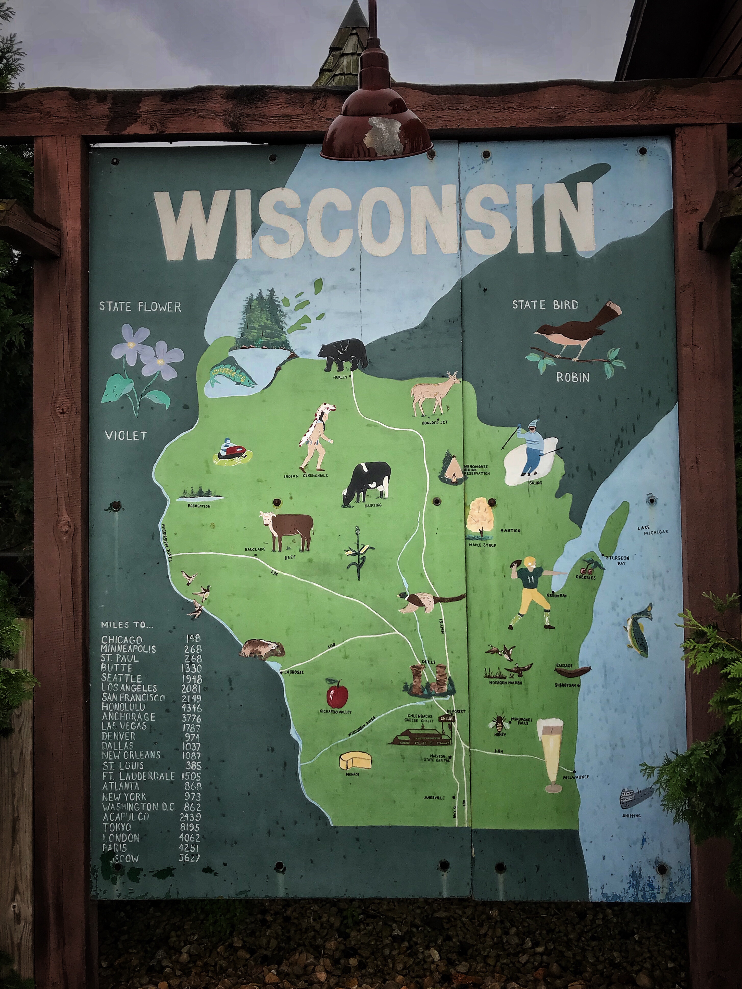 A map of Wisconsin with illustrations of different animals.
