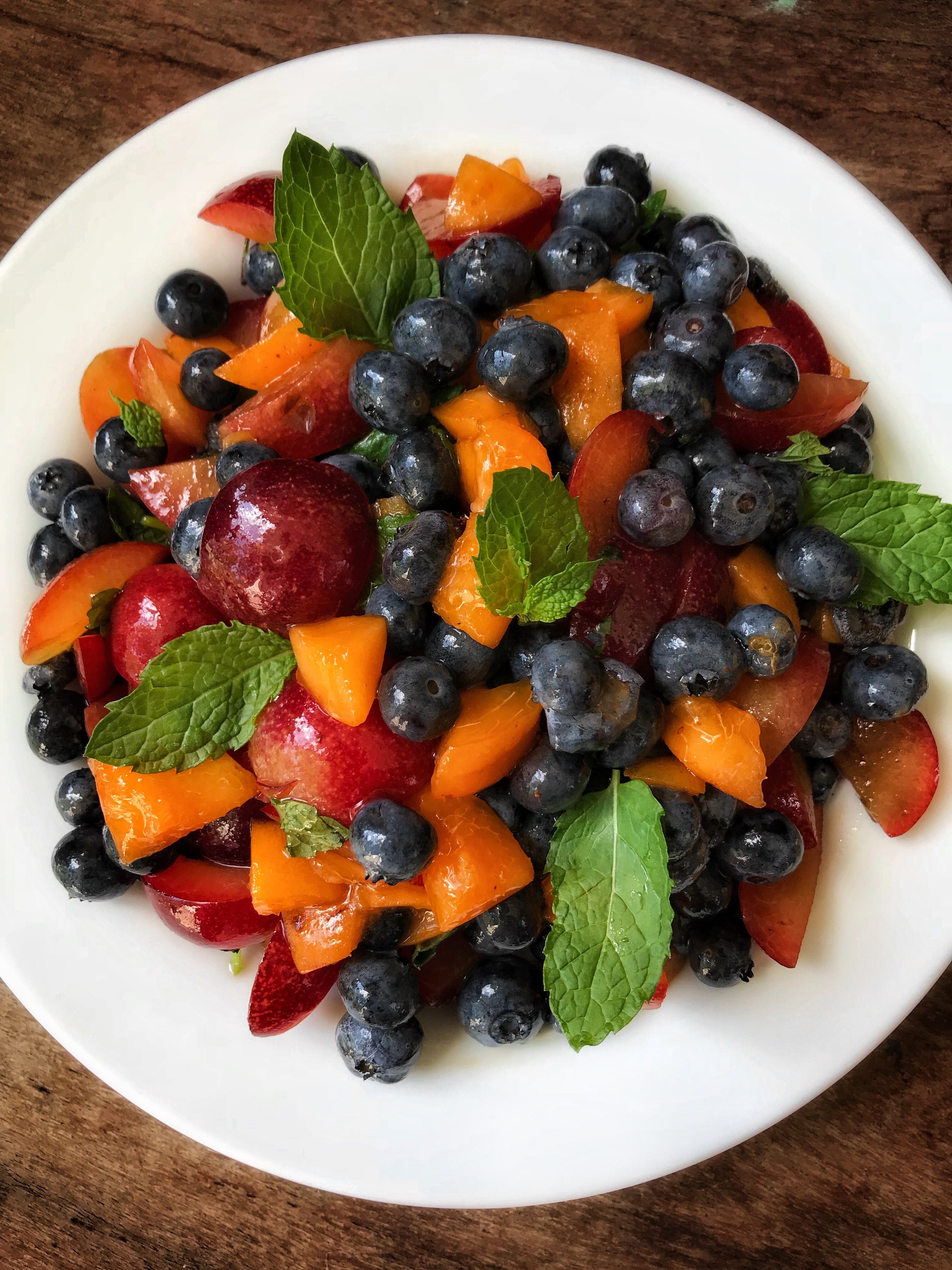 Stone fruit, apricots, blueberries and mint make this a perfect summer lunch.