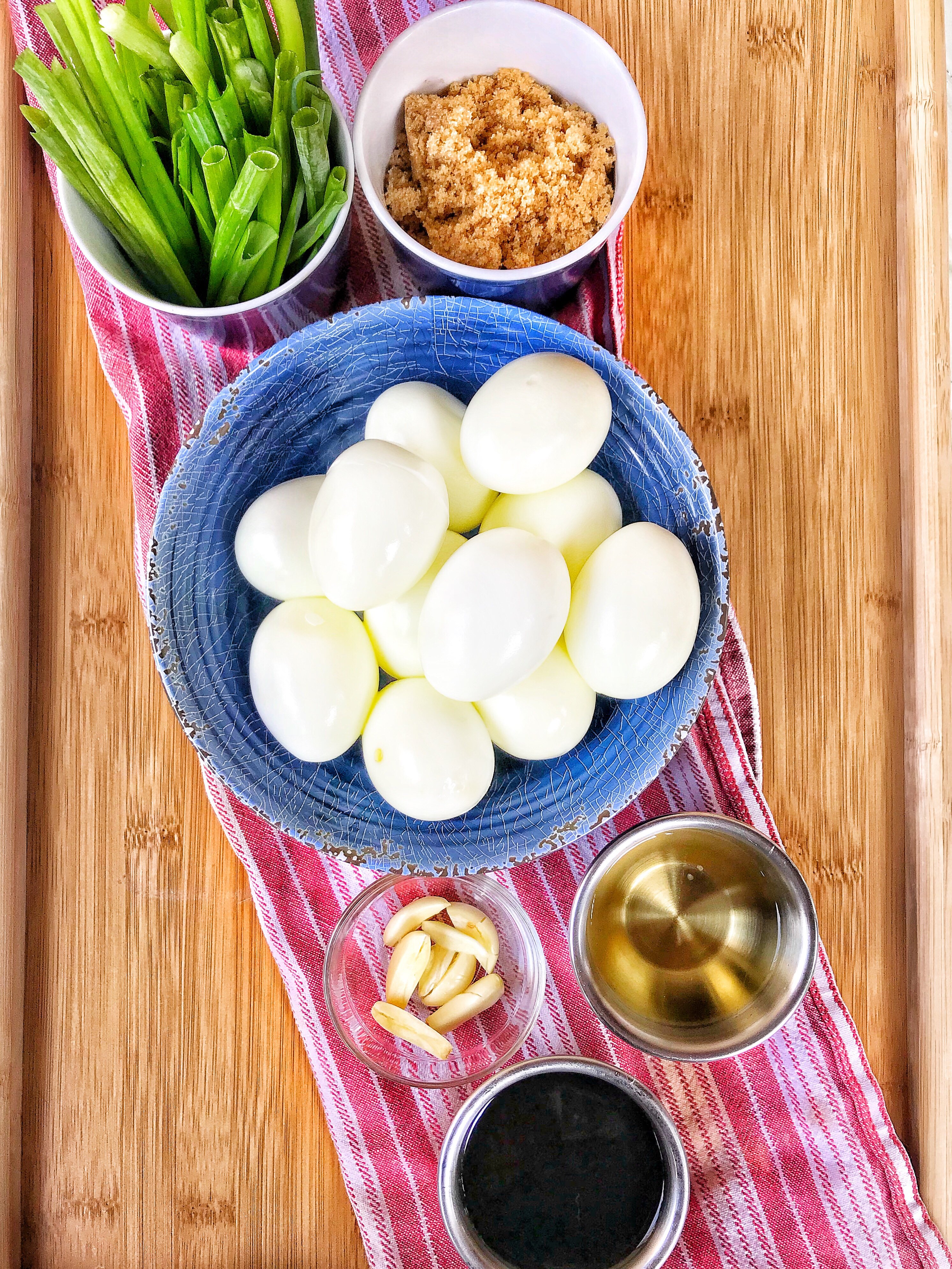 Hard Boiled Eggs, Brown Sugar, Soy Sauce, Rice Wine Vinegar, Garlic, and Green Onions.