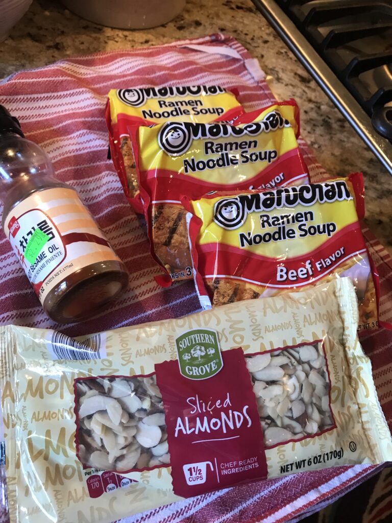 Packages of ramen noodles and sliced onions