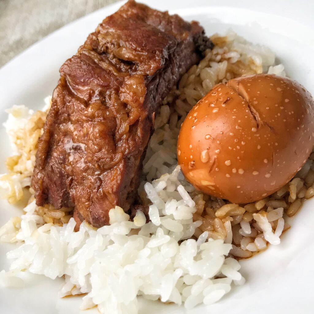 Soy Sauce Ribs with an egg over rice