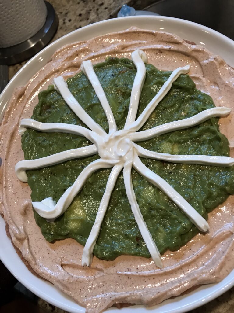 A partial sour cream spider web