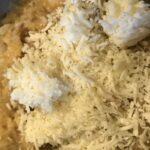 Cheese topping the mixture