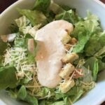Salad topped with dressing