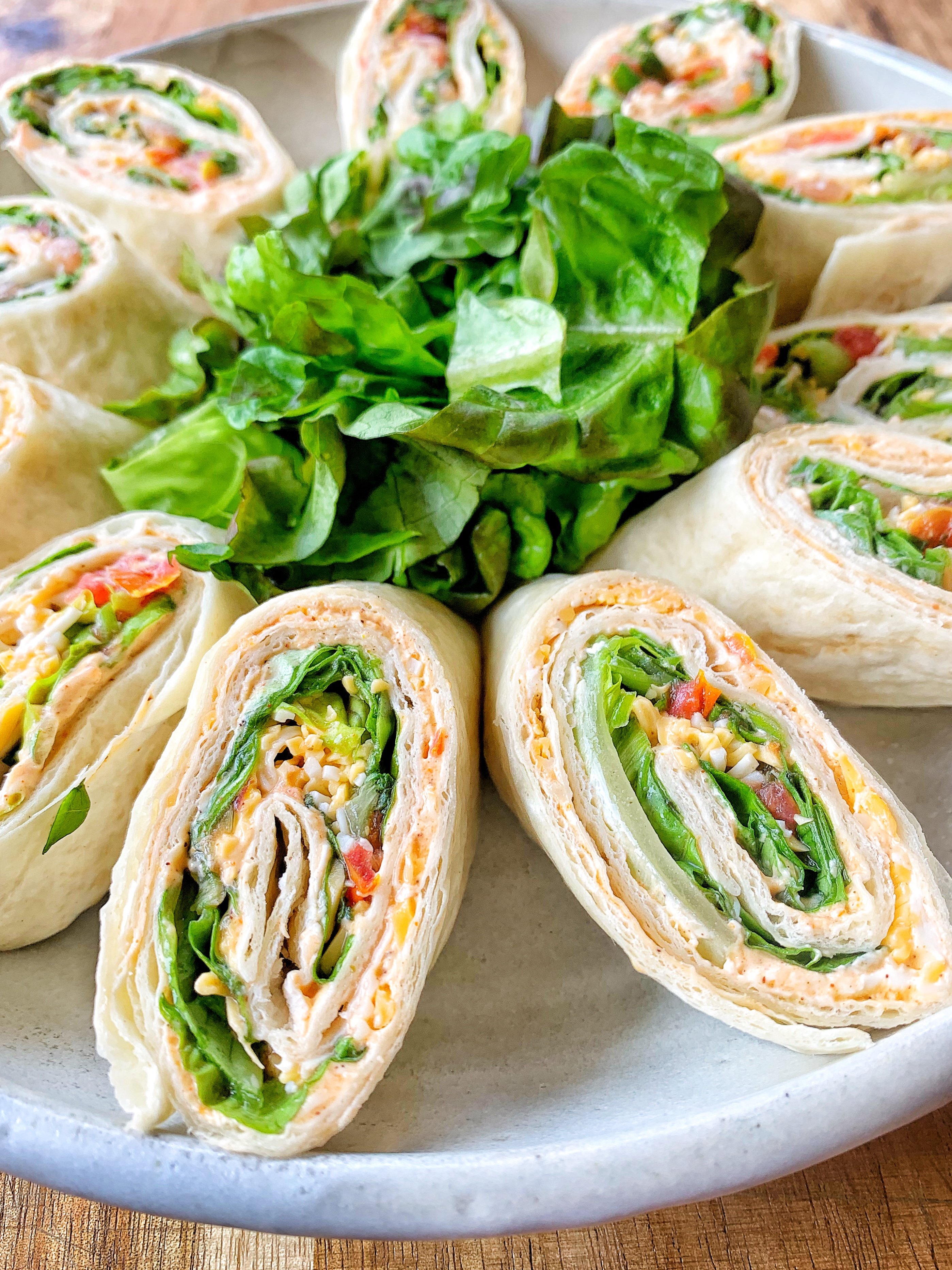 Tortilla roll ups with cheese and salsa.