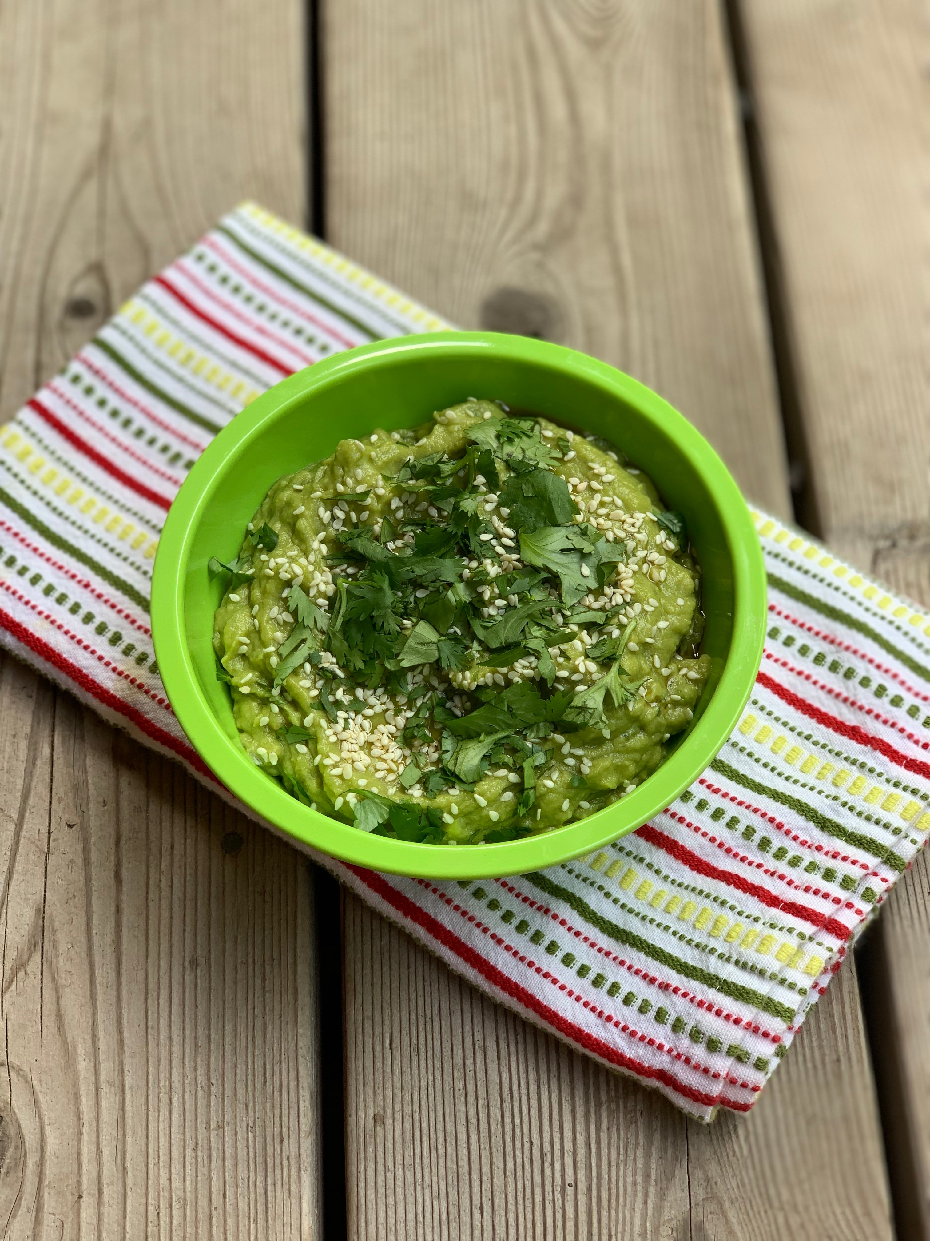 Guacamole with sesame seeds and cilantro