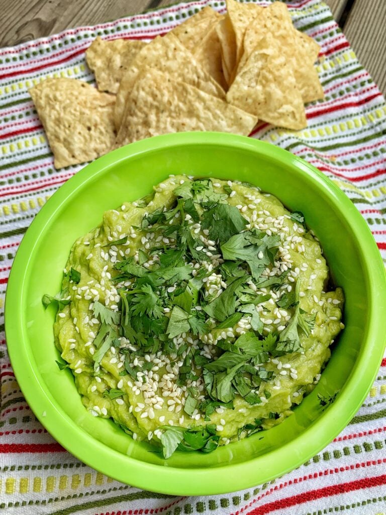 Guacamole with sesame seeds and cilantro