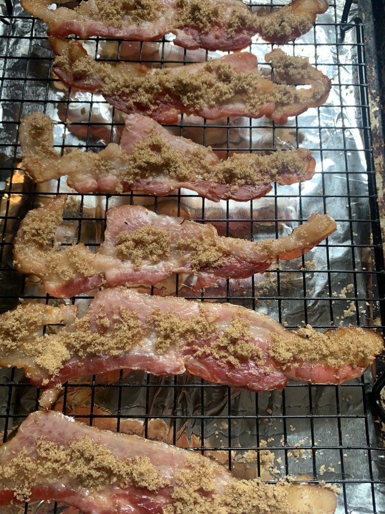 Bacon with brown sugar on a baking rack
