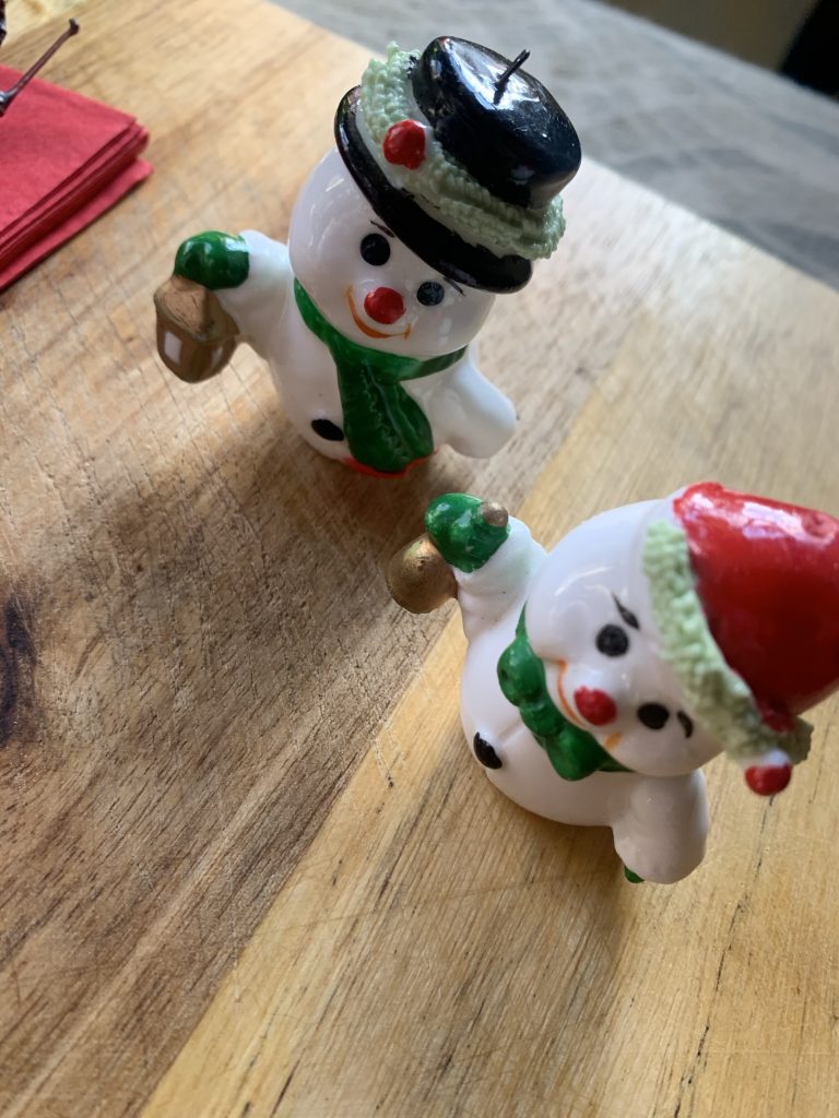 Two snowman figurines