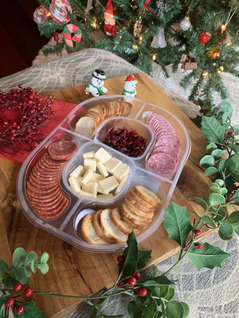 The social platter surrounded by holiday decorations
