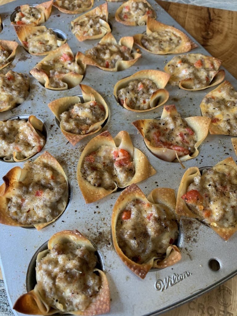 The finished sausage stuffed wontons with cheese
