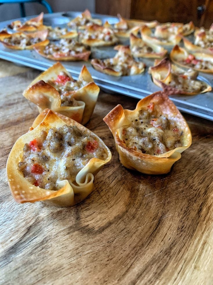 Sausage and cheese in a fried won ton wrapper