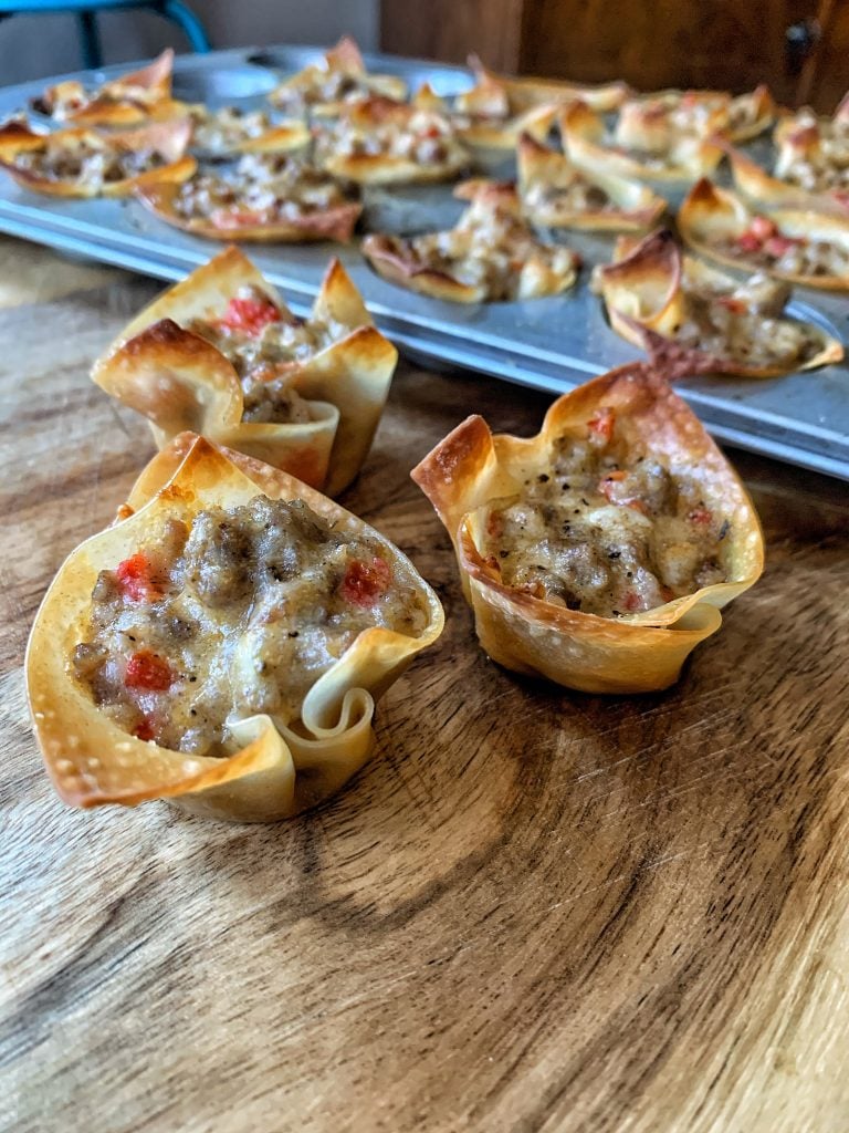 Sausage and cheese in a fried won ton wrapper