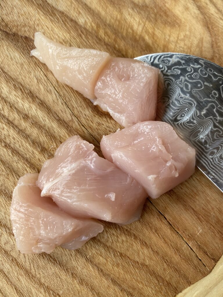 Raw chicken cut into pieces