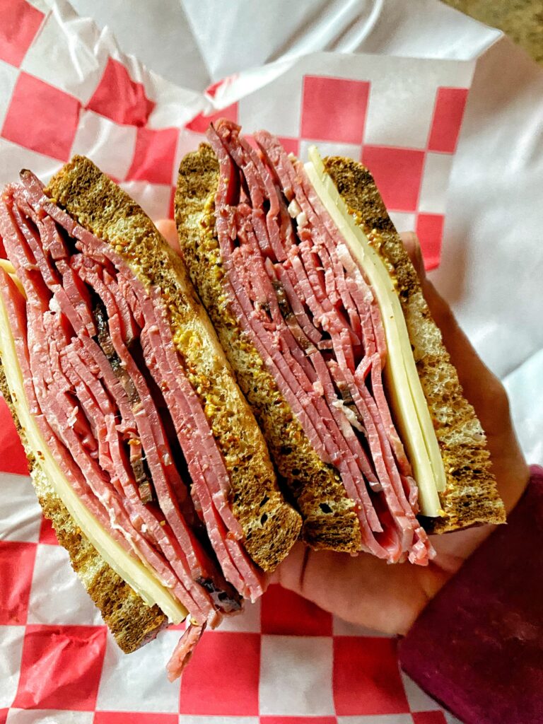 A pastrami and corned beef sandwich