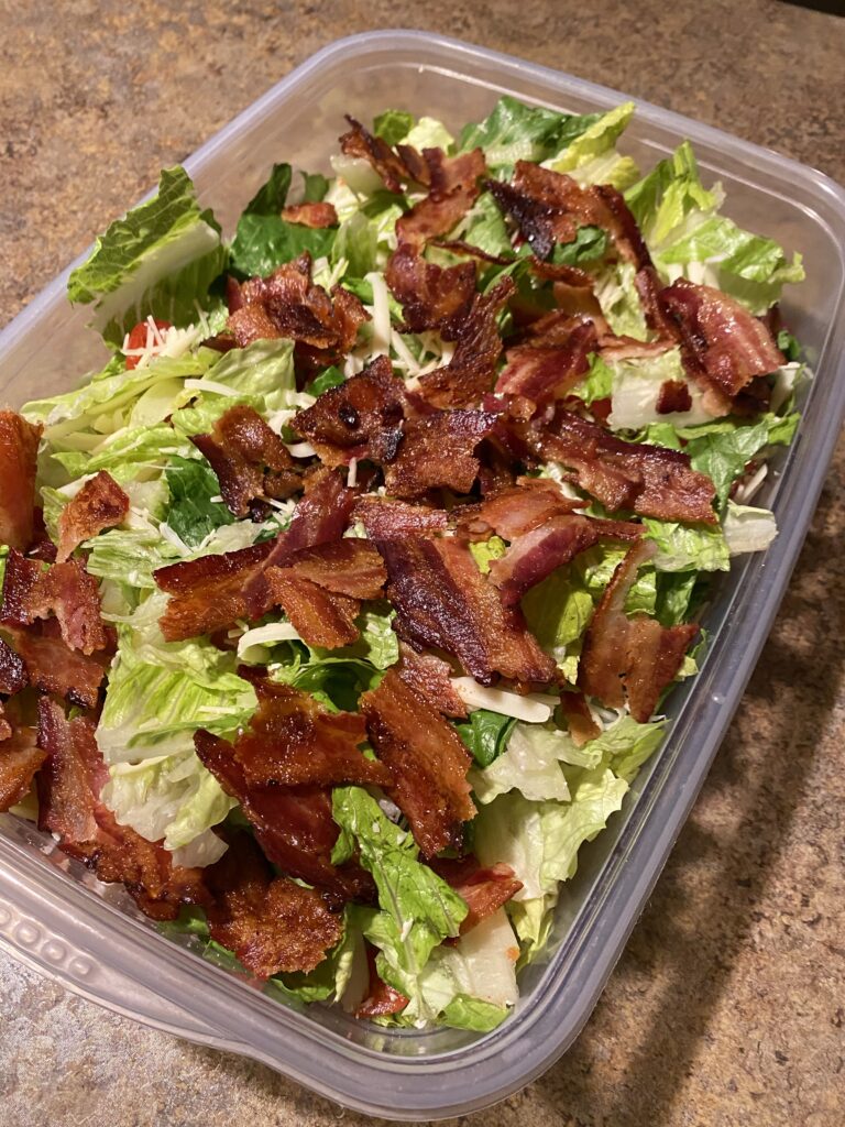 Super Salad topped with bacon