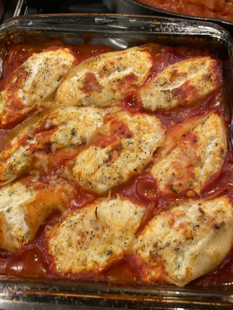 The finished stuffed shells after being baked