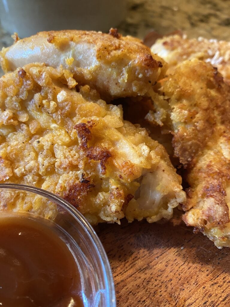 Crispy chicken breasts served with a BBQ dipping sauce