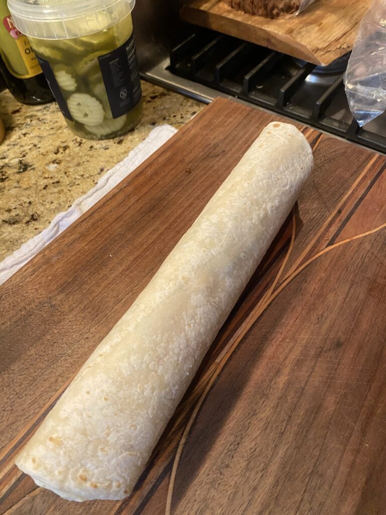 A rolled up wrap before being cut into slices
