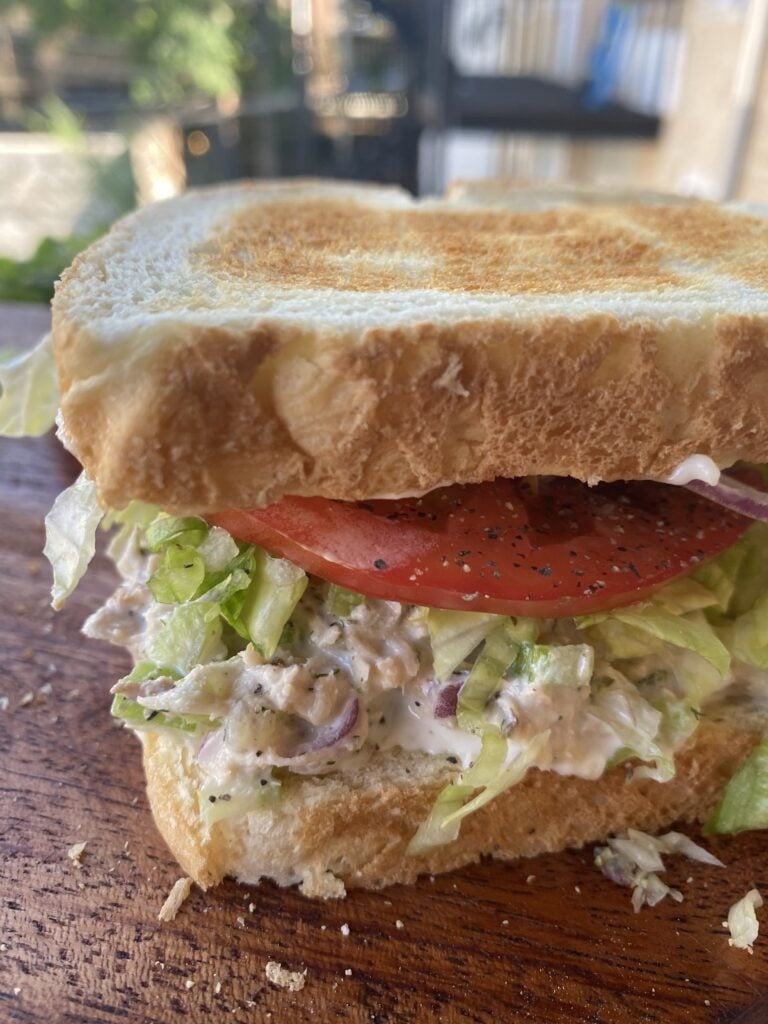 A close up of a tuna salad sandwich