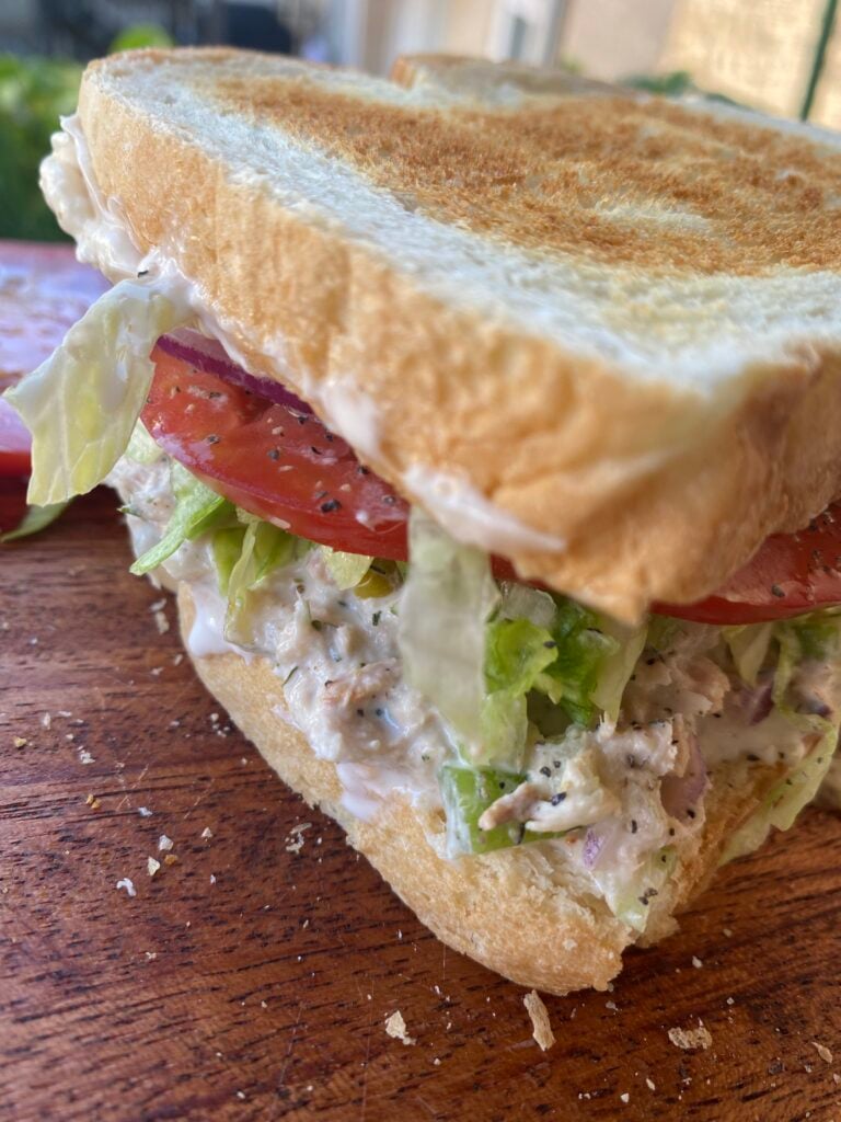 A close up of a tuna salad sandwich