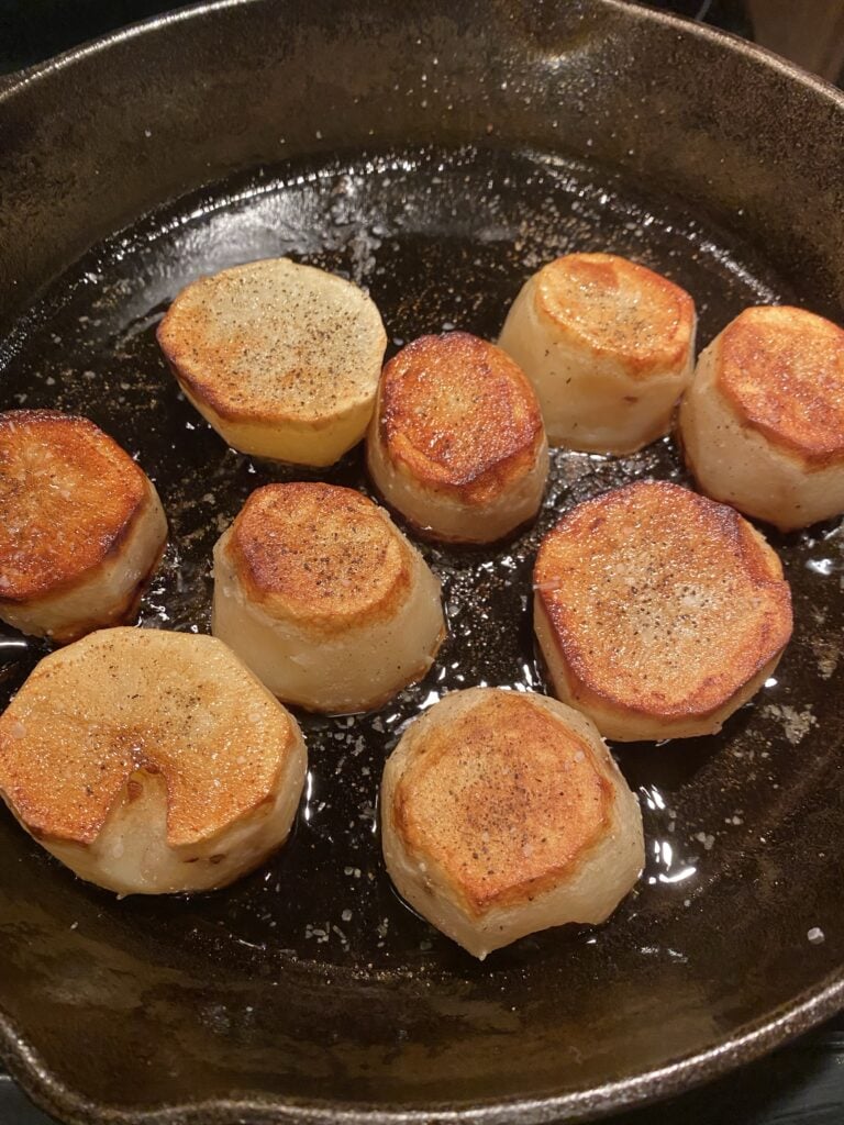 Fancy potatoes being pan fried