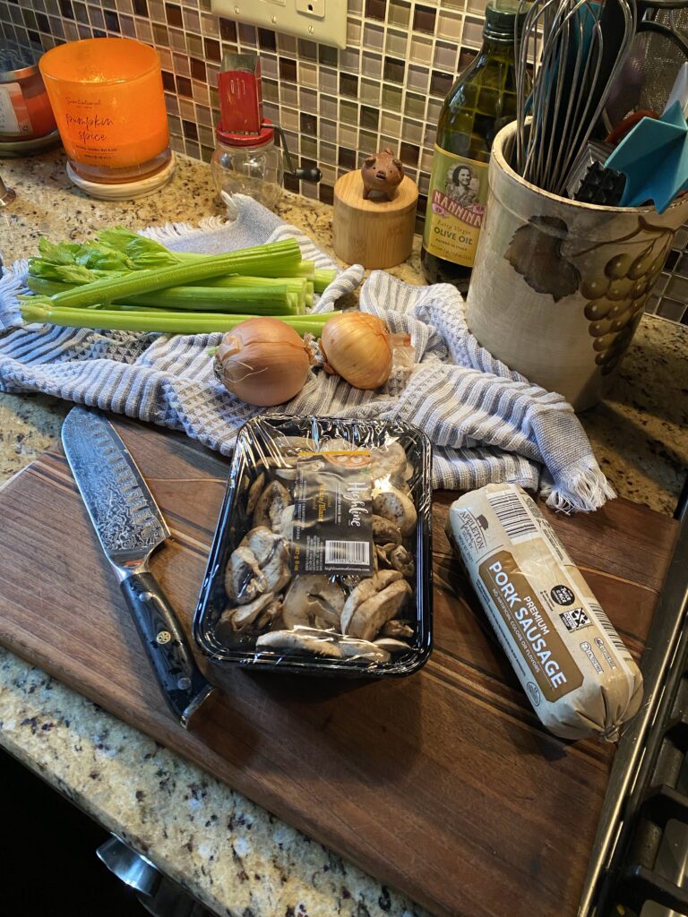 Mushrooms, pork sausage, onions, and celery