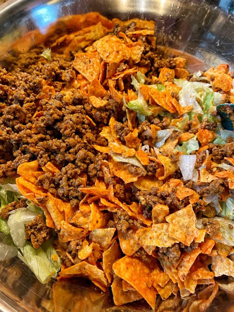 A close up view of the Midwestern Taco Salad in a metal bowl