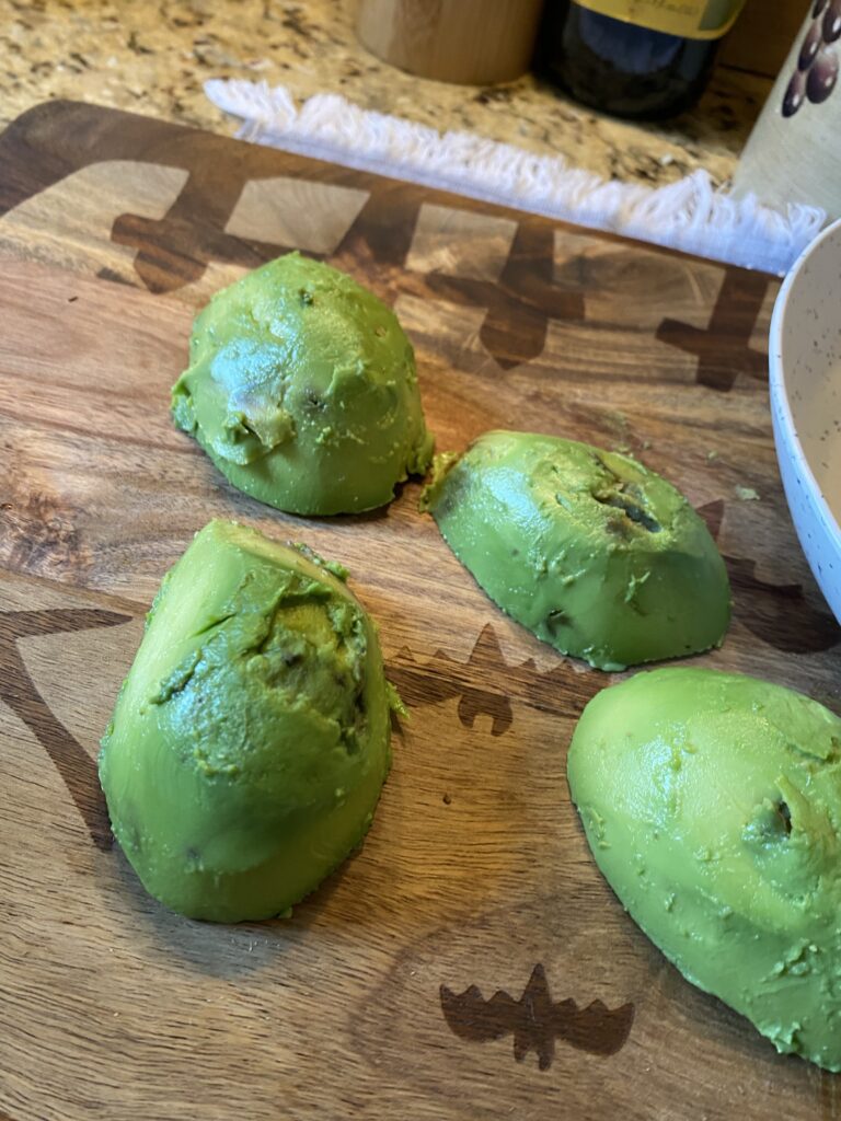 Skinned, halved avocados