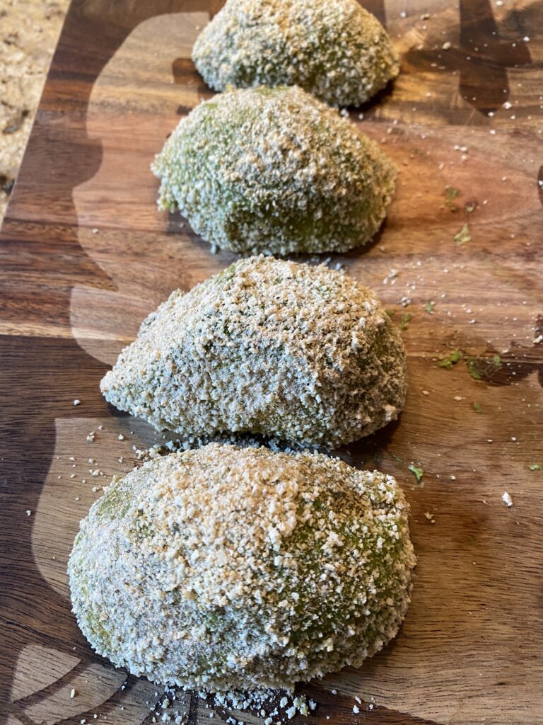 Breaded, halved avocados 