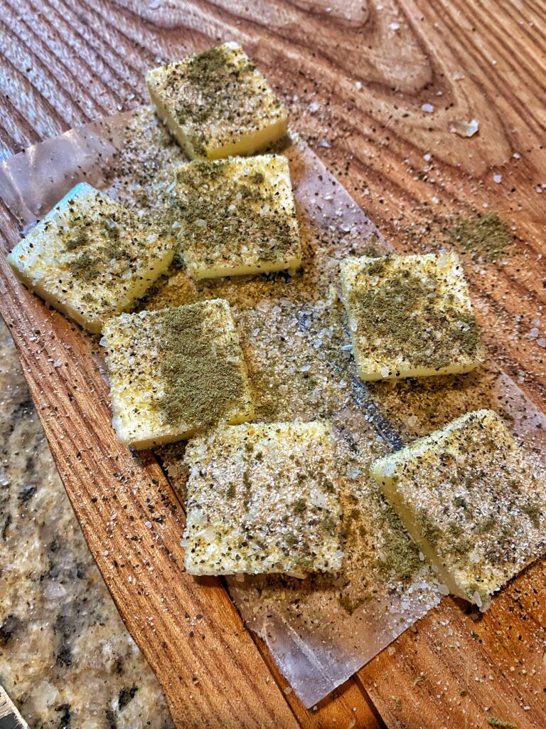 Seasoned pats of butter