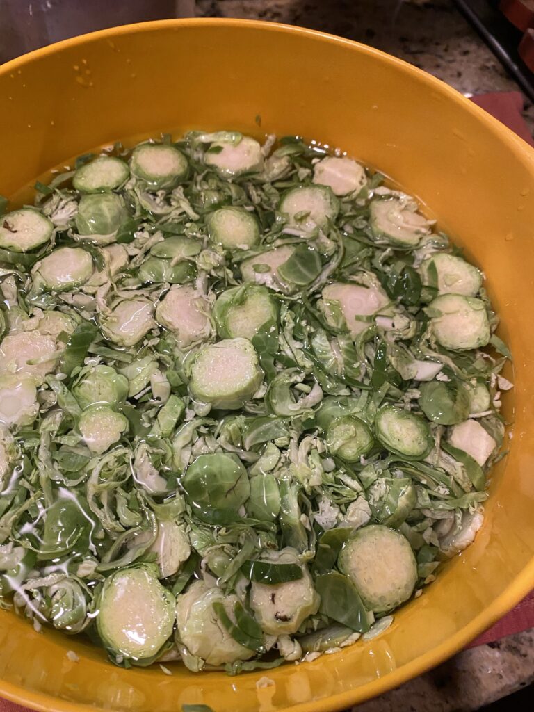 Brussels Sprouts soaking in water