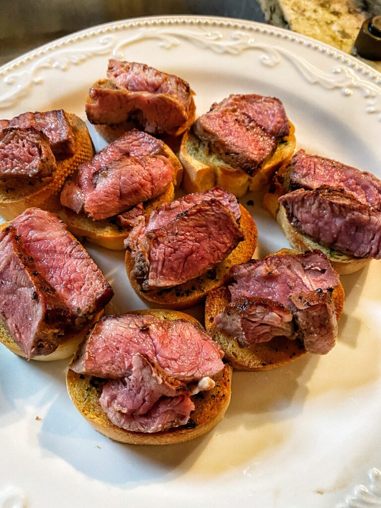 Garlic steak bites on a plate
