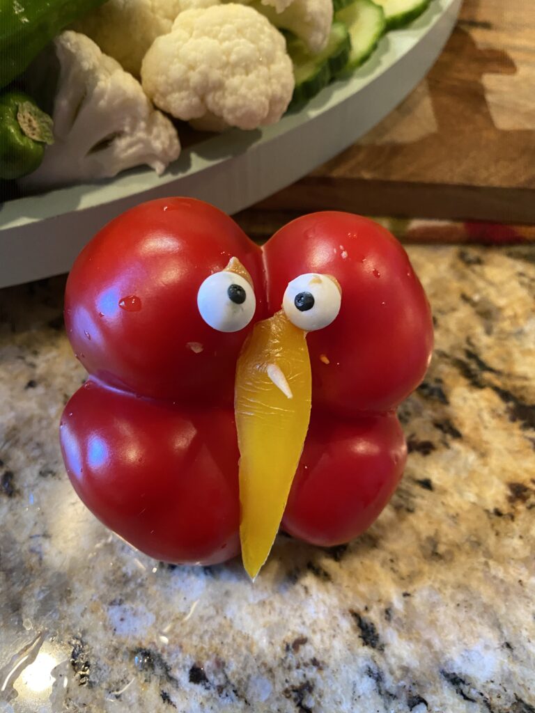 A bell pepper shaped like a turkey's face without the beak