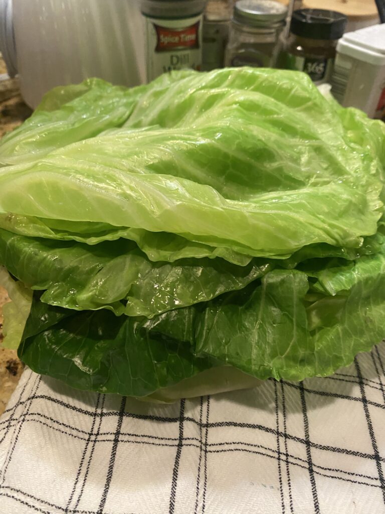 Cabbage leaves cooling on a towel