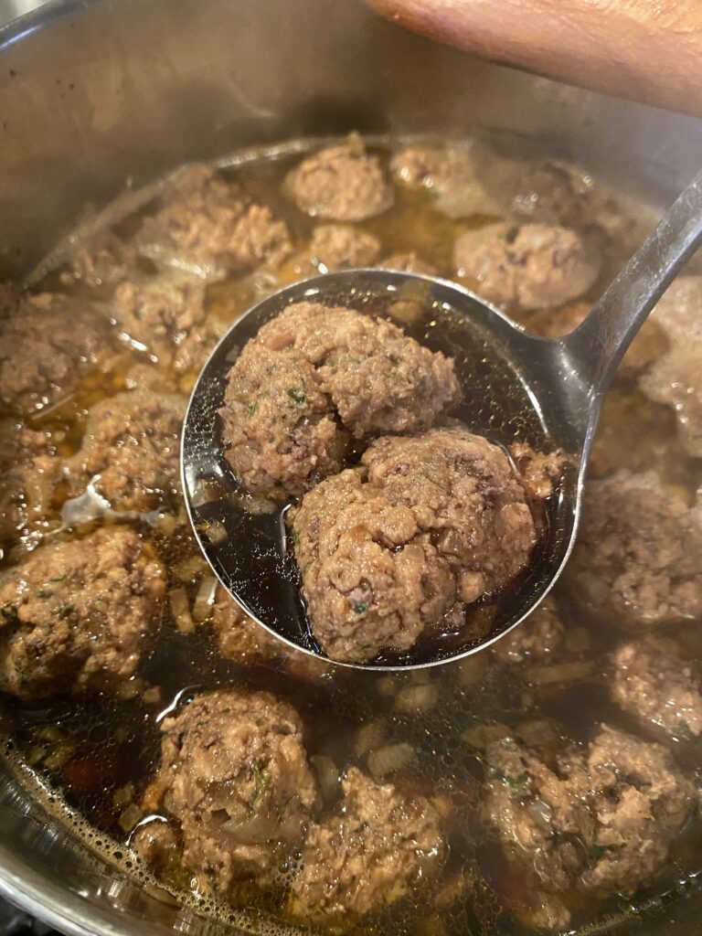 Liver dumplings on a ladle