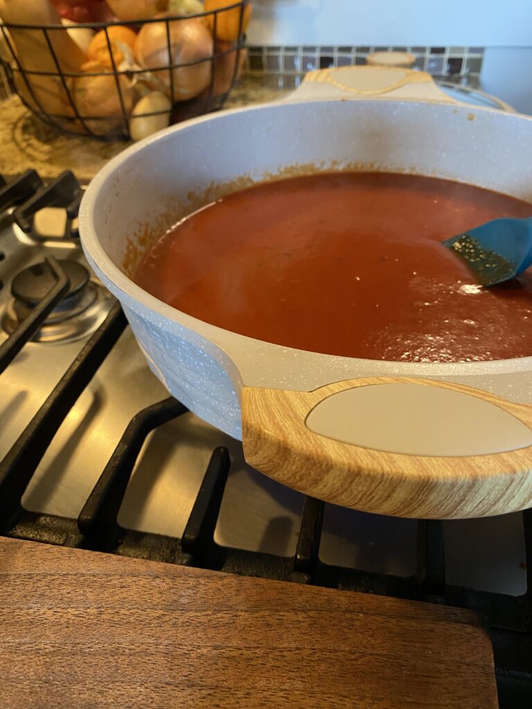 Tomato sauce cooking in a pot