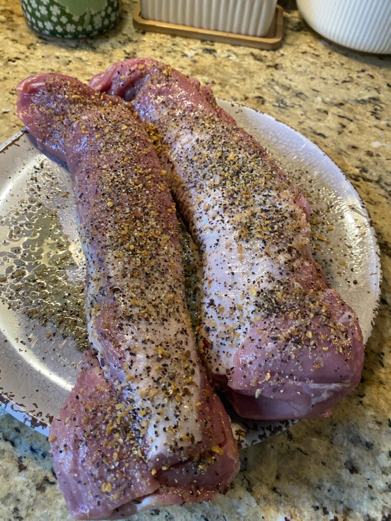 Seasoned, raw pork tenderloins