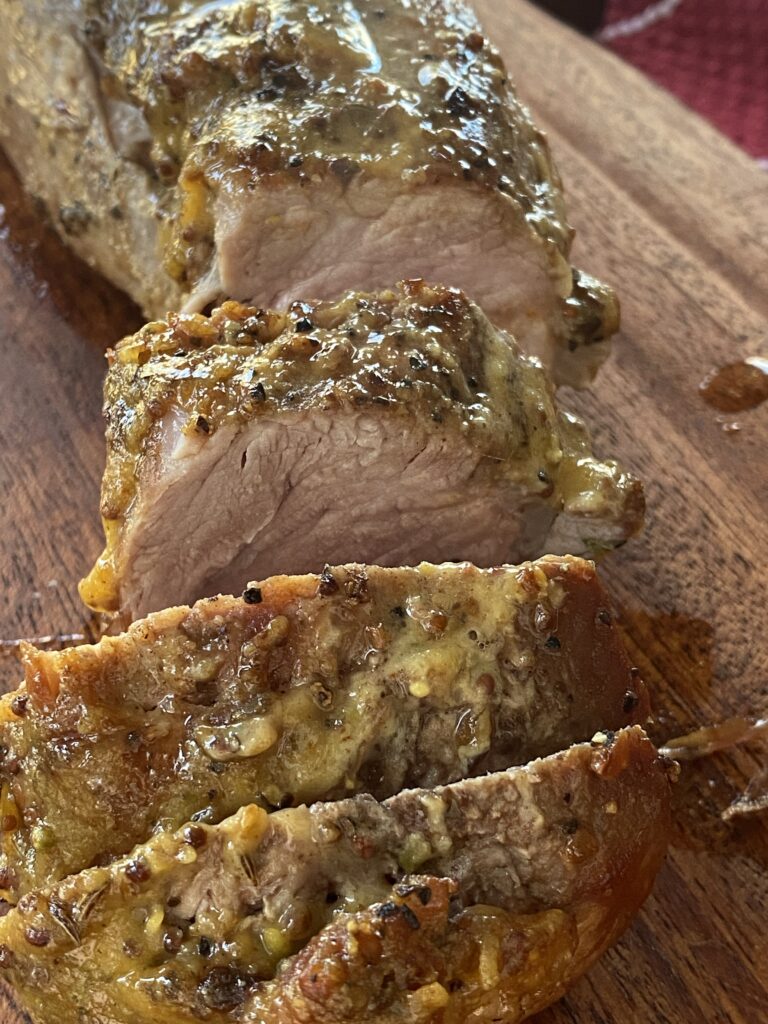 A close up of sliced pork tenderloin