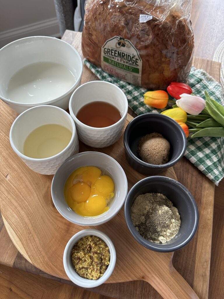 The ingredients for the ham sauce including eggs, mustard seed, and other seasonings