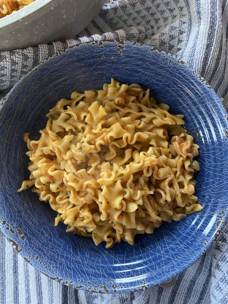 A blue bowl of Easy Sunday Pasta