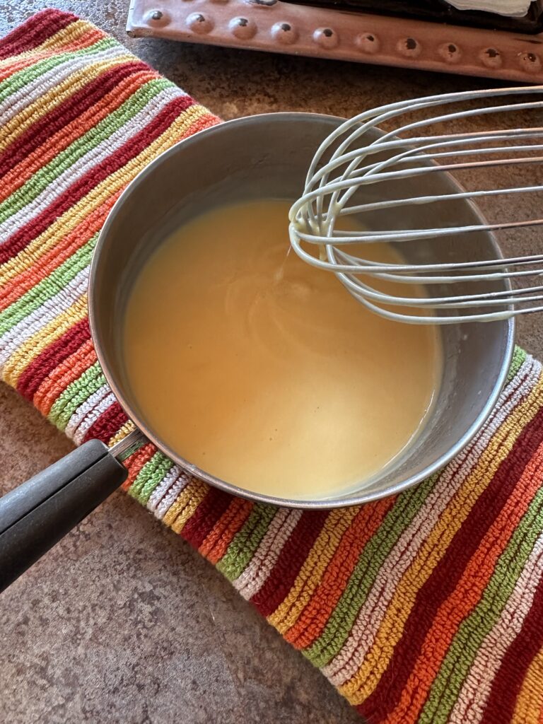 A pot of Hollandaise sauce