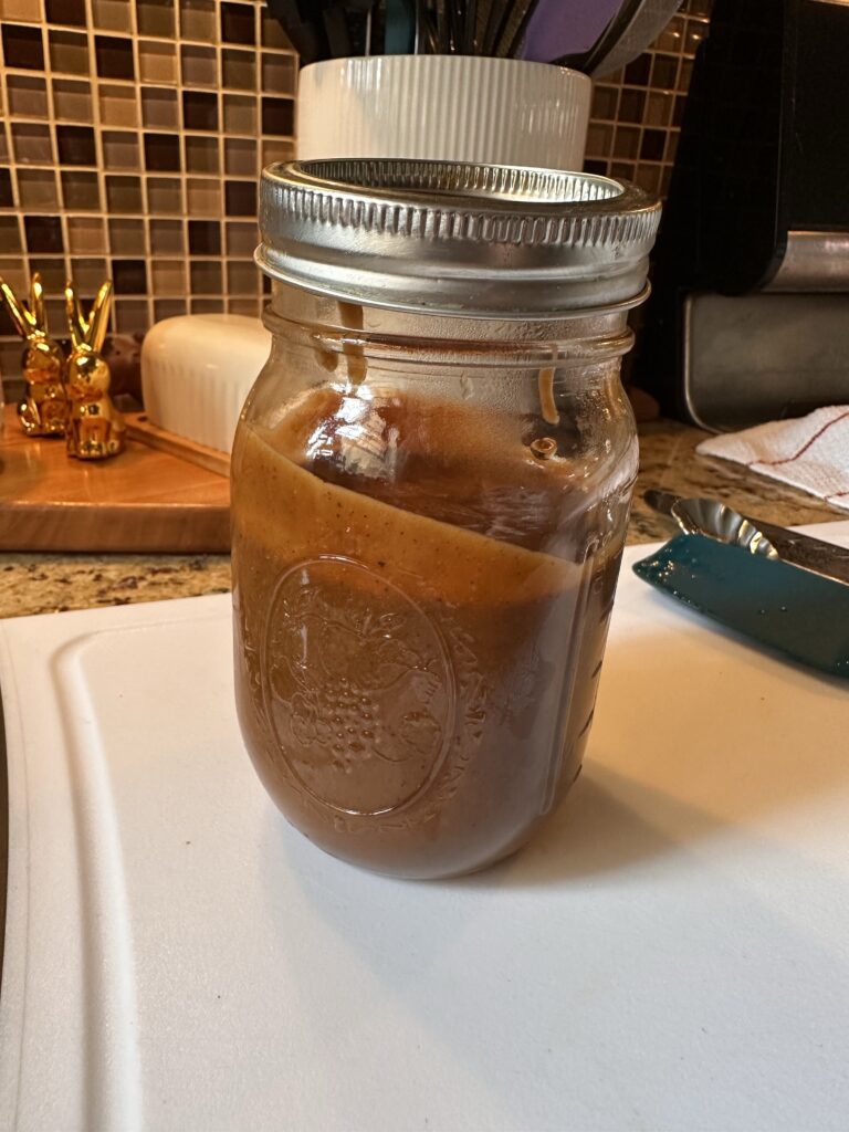 Peanut dressing in a glass jar