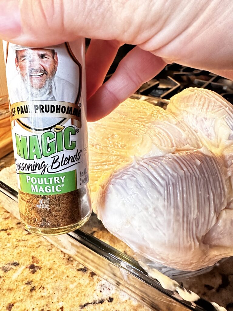 A shaker of Chef Paul Prudhomme Poultry Magic