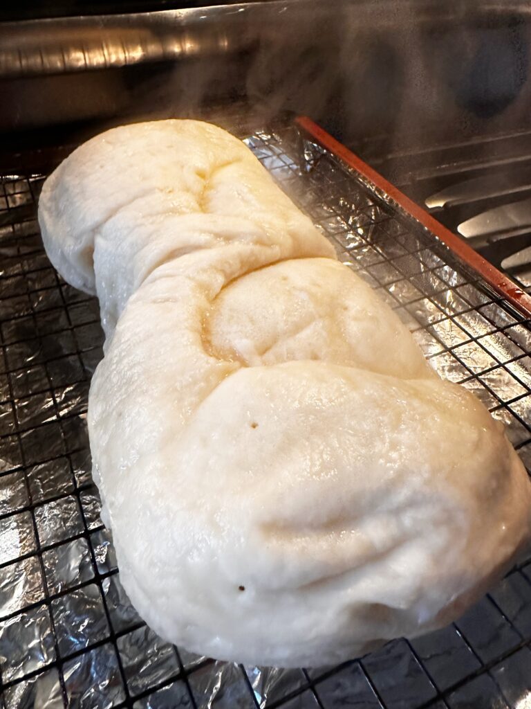 The boiled bread loaf before being cut