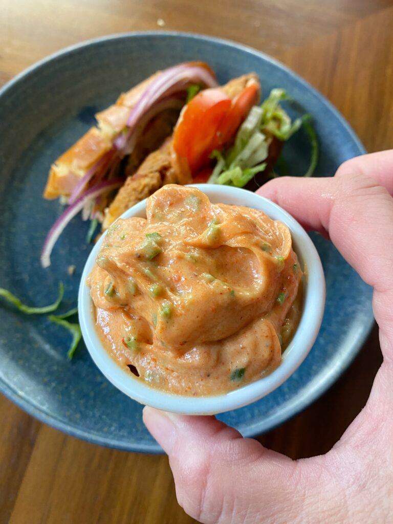 A cup of sandwich sauce