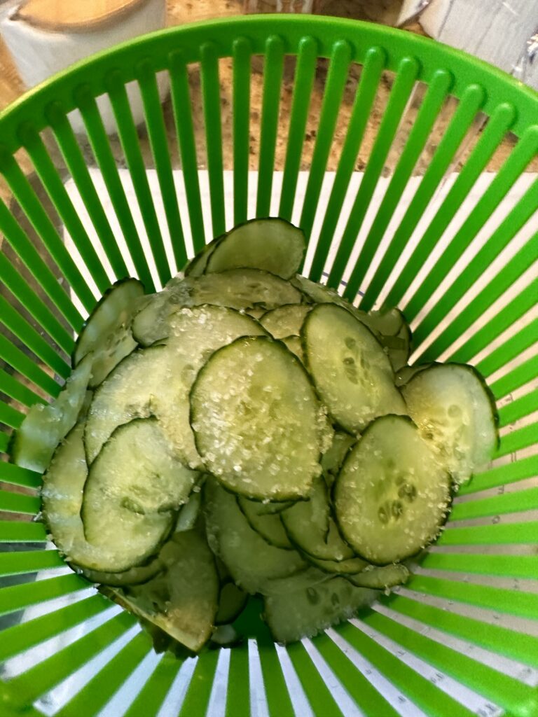 Salted, thinly sliced cucumbers