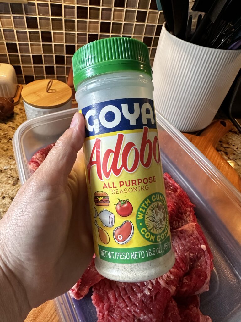 A bottle of Goya adobo seasoning with cumin
